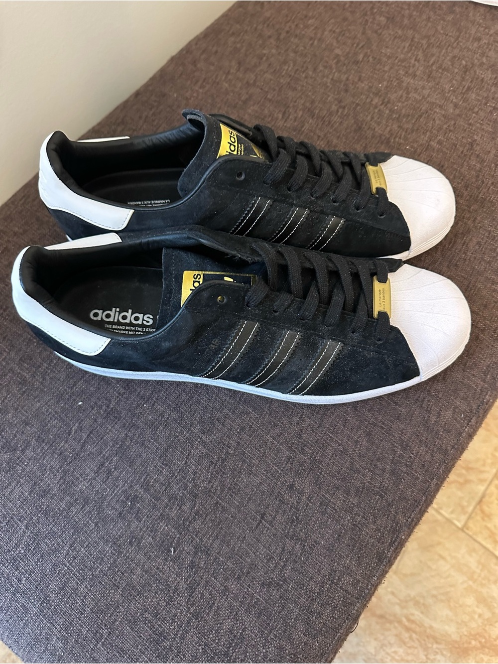 adidas Men’s Black & White Suede Shell-Toe Sneakers with Yellow Accents